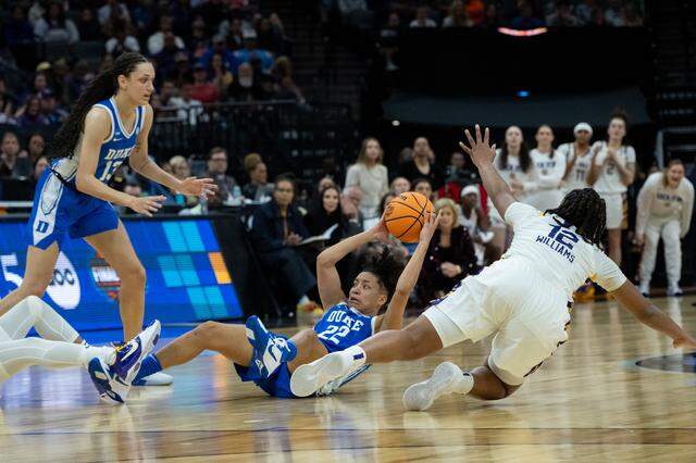 Duke Blue Devils guard Taina Mair (22) tries to pass the ball while being guarded by Louisiana State University Tigers guard Mikaylah Williams during the NCAA Women’s Basketball Tournament Sweet 16 game at Golden 1 Center in Sacramento on Friday, March 27, 2026..